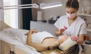 aesthetic nurse with injectables and woman treatment